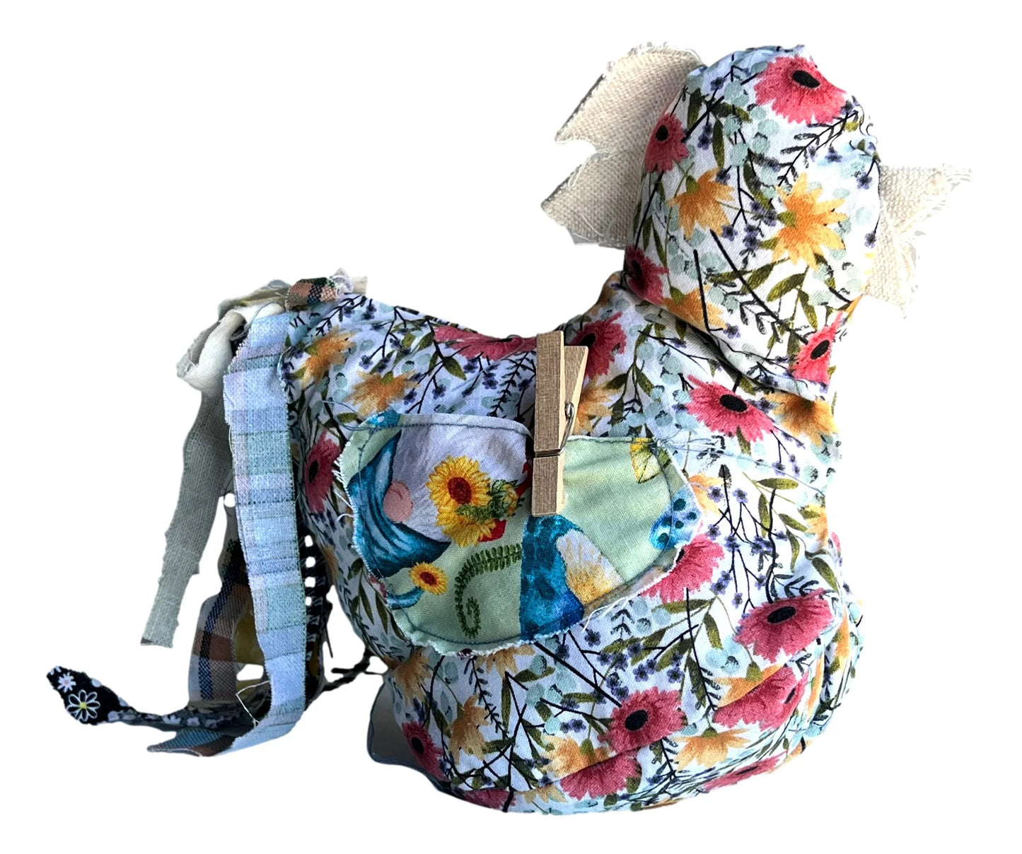 Hand-sewn chicken decor with button eyes, featuring front and back pockets, perfect as a unique home accent by Ysleta Mission Gift Shop.