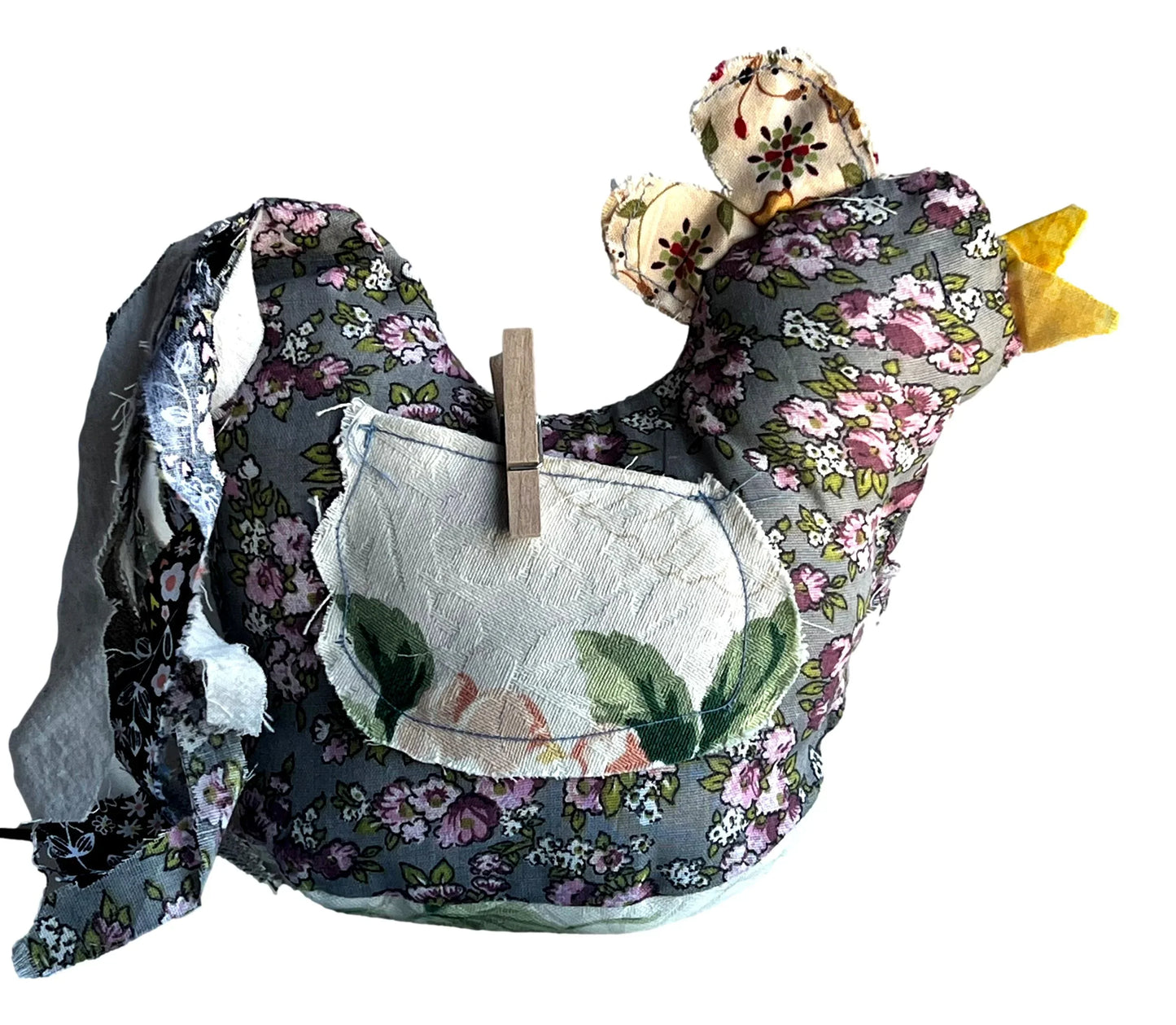 Hand-sewn chicken home accent with button eyes, 9x7 inches, featuring front and back pockets, crafted by Ysleta Mission Gift Shop.