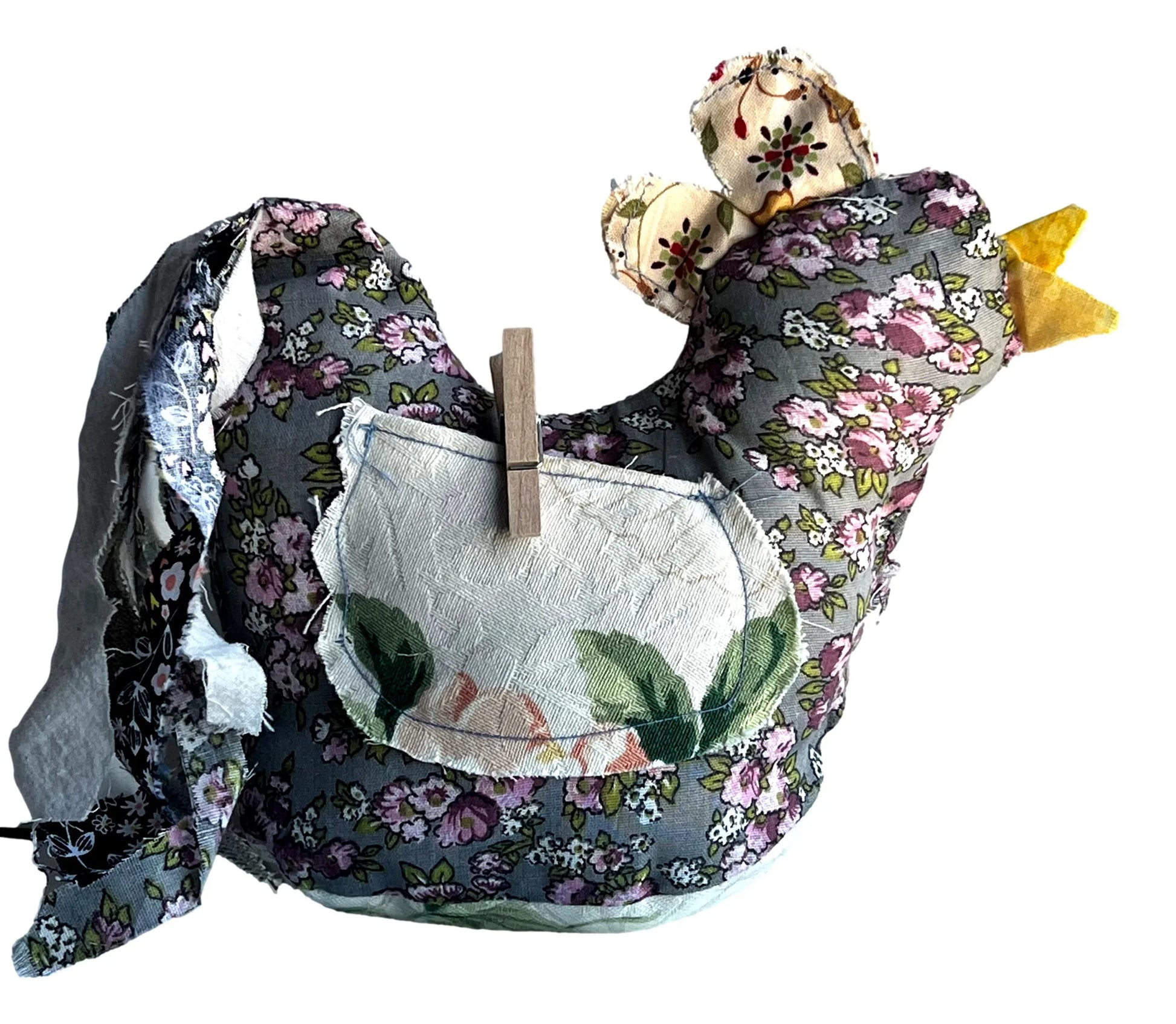 Hand-sewn chicken home accent with button eyes, 9x7 inches, featuring front and back pockets, crafted by Ysleta Mission Gift Shop.