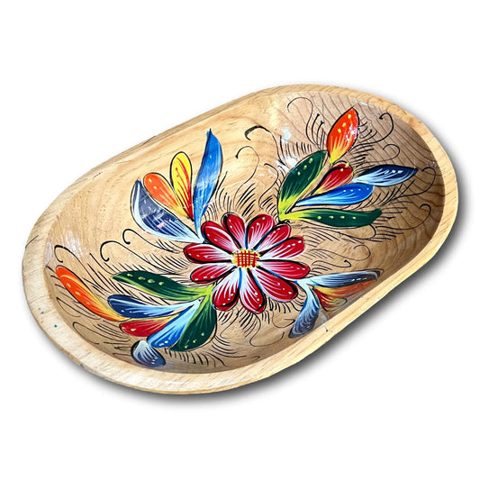 Handcrafted Batea wood bowl with artist-painted floral design, decorative home and garden artisan piece.