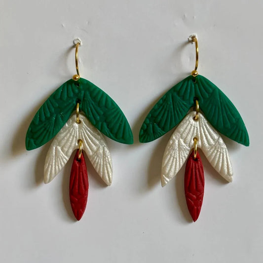 Handcrafted clay 3-tier leaf dangle earrings with gold-plated hooks by Melissa Cortinas, featuring detailed leaf design.