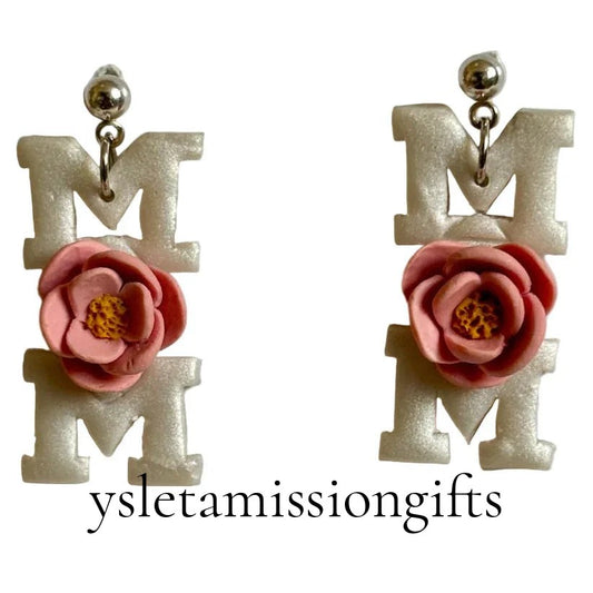 Handcrafted clay floral dangle earrings with stainless steel posts by Melissa Cortinas, featuring colorful floral design.