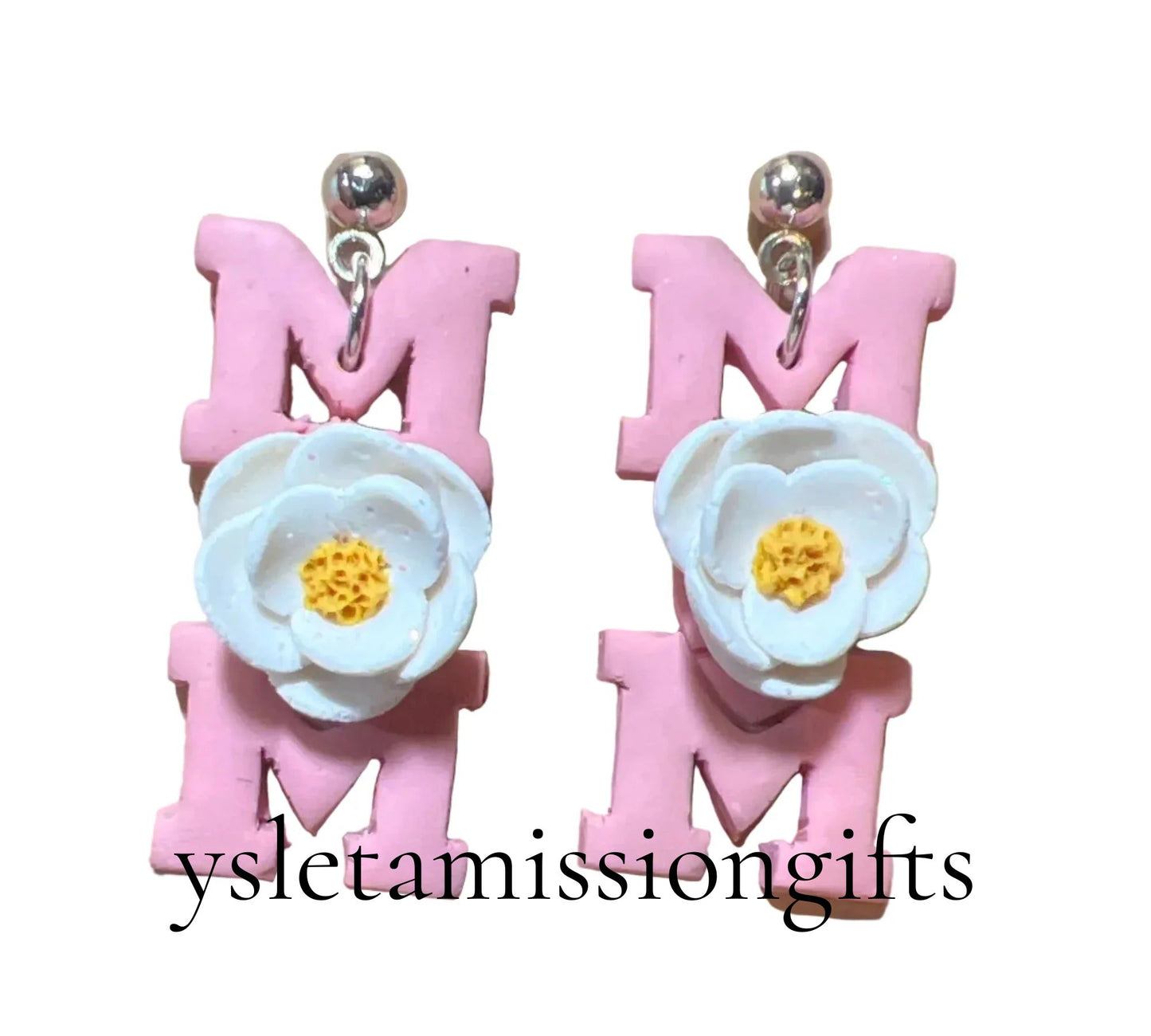 Handcrafted clay floral dangle earrings with stainless steel posts by Melissa Cortinas, featuring colorful floral designs.