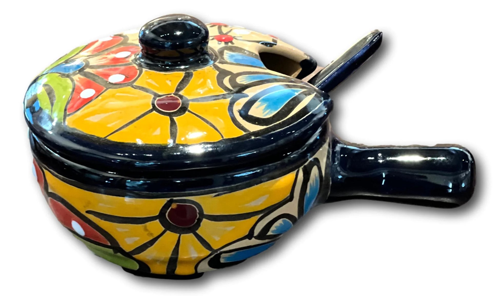 Handcrafted salsa bowl with lid and serving spoon from Ysleta Mission Gift Shop, featuring traditional design and ceramic craftsmanship.