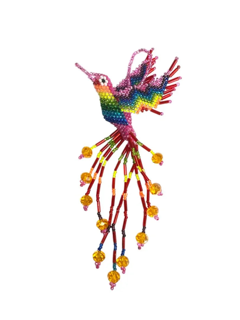 Handmade beaded hummingbird keychain by Jose Alberto Chavez, featuring colorful beads and detailed bird design.