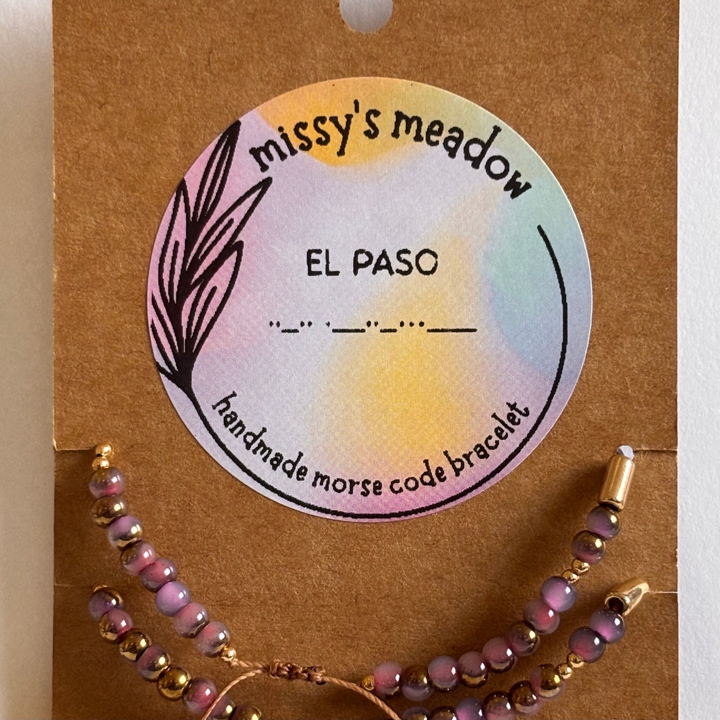 Handmade beaded souvenir Golden Rose bracelet by Melissa Cortinas featuring intricate beadwork and a golden rose charm.