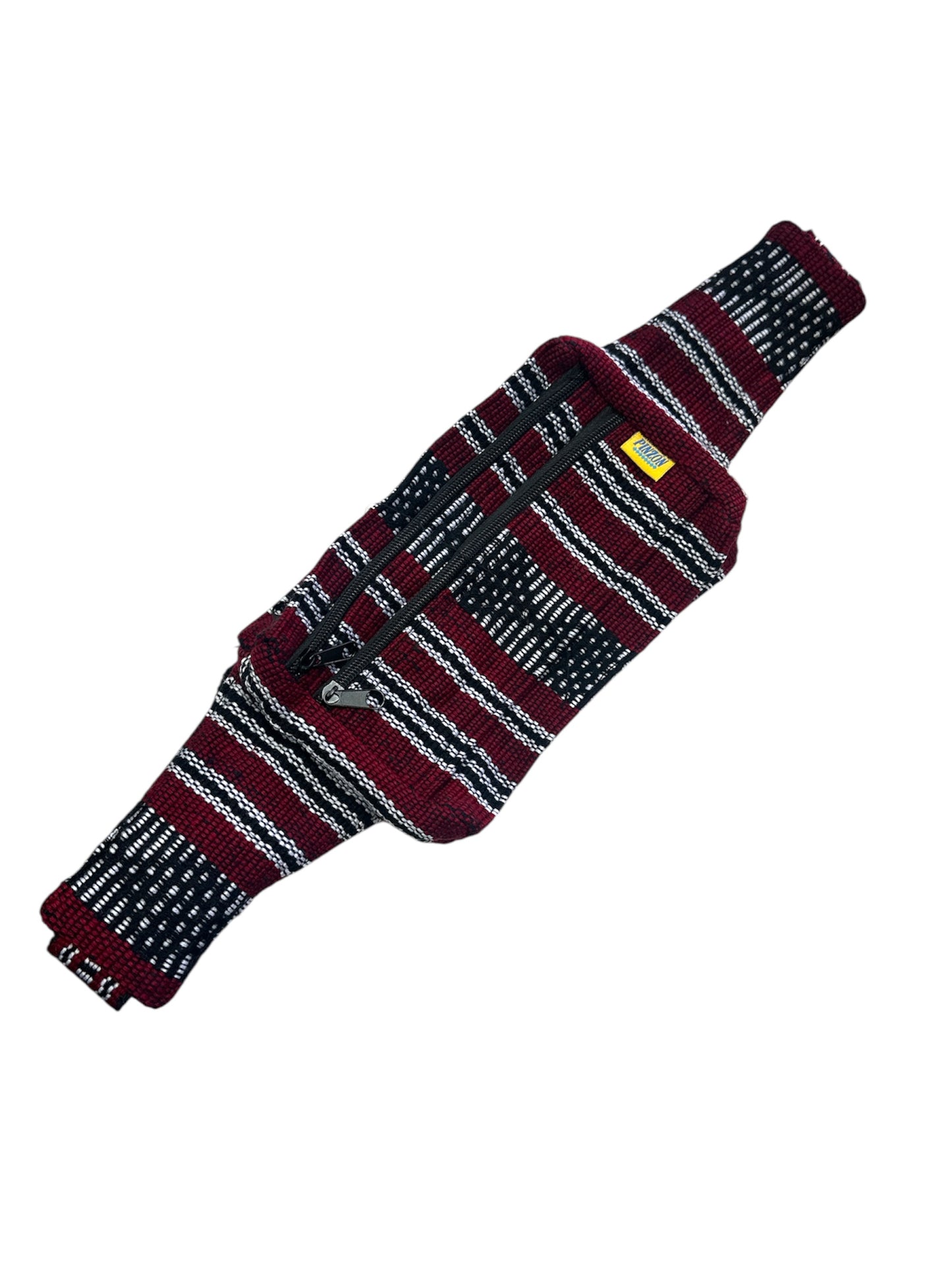 Handwoven artisanal fanny pack with colorful Mexican fabric, stylish waist bag from Ysleta Mission Gift Shop.