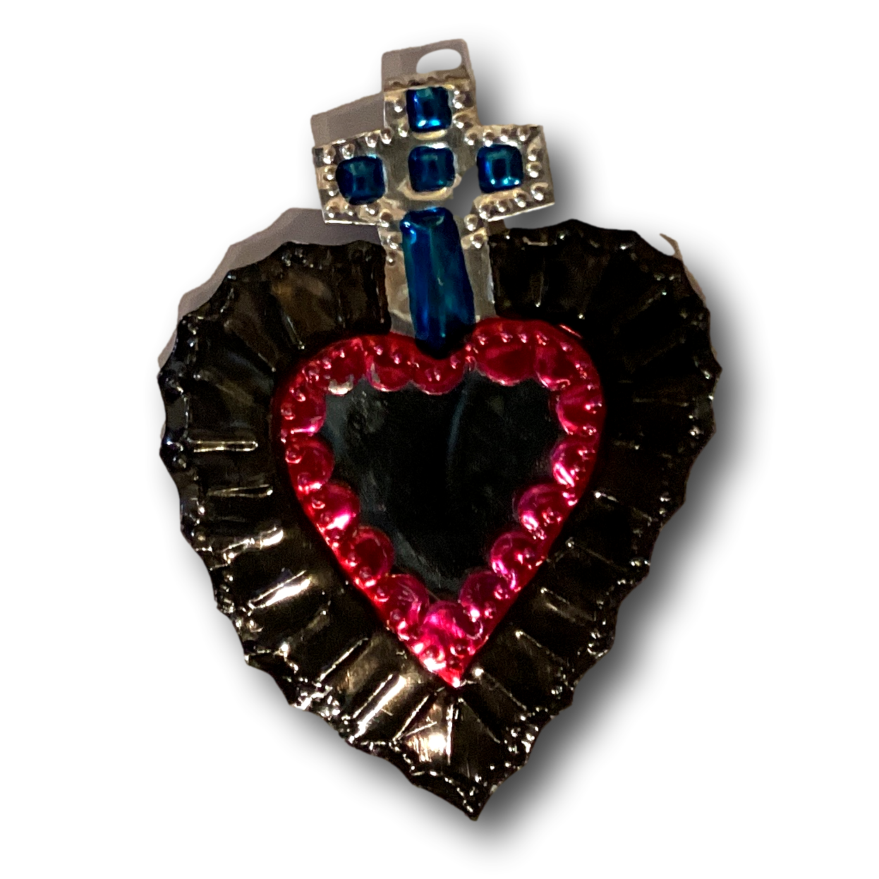 Rustic 5-inch Mexican tin heart magnet with vibrant colors, perfect for refrigerator decor from Ysleta Mission Gift Shop.