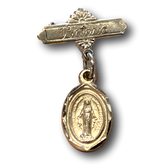 Victoria Immaculate Conception 1-inch lapel pin featuring religious imagery, crafted by Ysleta Mission Gift Shop.