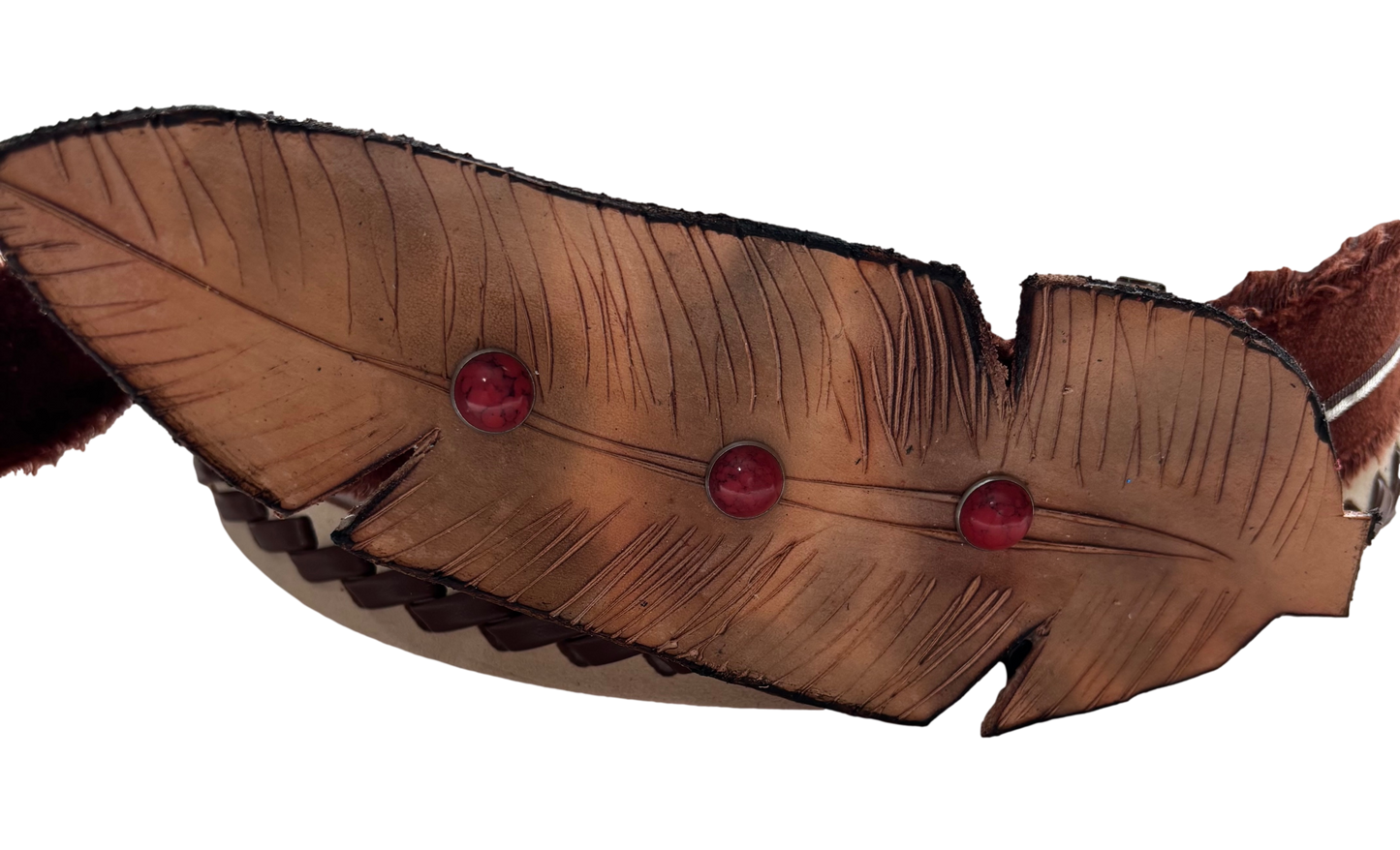Leather feather hat clip by Consuelo Barraza featuring a stylish leather and feather design for hair accessories.