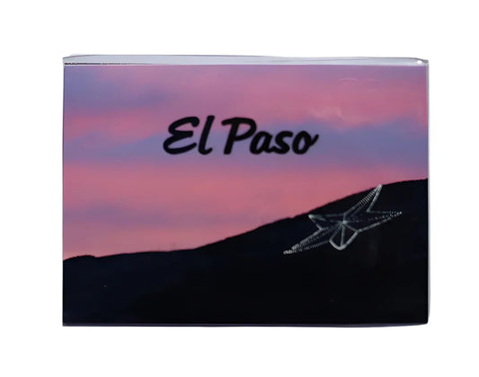 Pink sky mountain design magnet by Miguel Martinez featuring stars, 2.5 x 3.5 inches with durable finish, part of El Paso souvenirs.