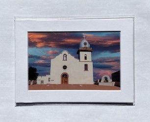 Matted Ysleta Mission print with clouds, 4x6 inches, artwork by Miguel Martinez, displayed as a framed souvenir art piece.