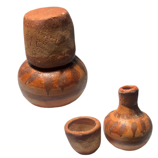 Handmade Mexican clay water jug and cup set with rustic finish, ideal for home and garden tablescapes.