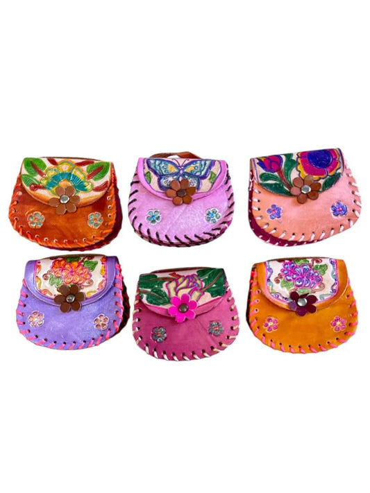 Mini hand-tooled leather bag with floral design, ideal for children, by Jose Alberto Chavez, measuring 4 x 4.5 inches.