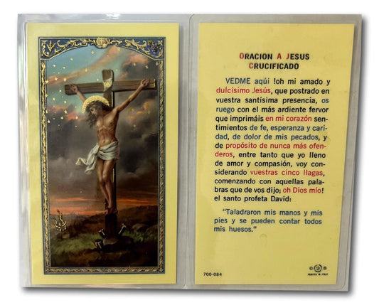 Laminated prayer card with image of Jesus Crucified at the Cross, featuring Spanish reflection of mercy, Catholic gift from Ysleta Mission.