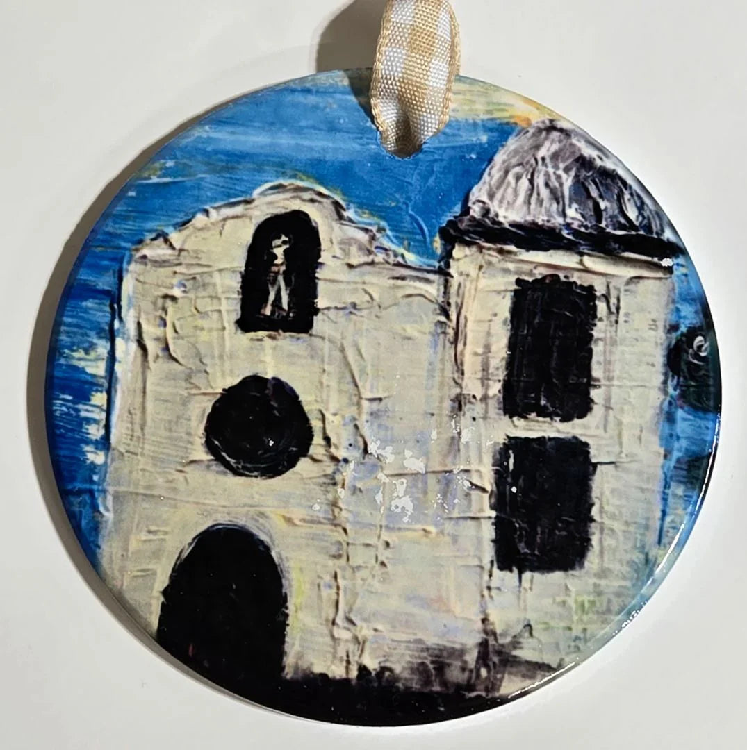 Colorful round ornament featuring vibrant sublimated original art with a ribbon, designed by Vanessa Clark.