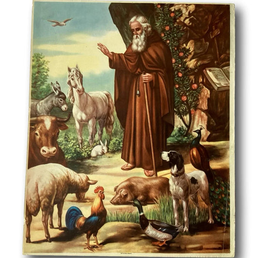 Framed out-of-print religious image of Saint Anthony Abbot with animals, a Catholic devotional print from Ysleta Mission Gift Shop.