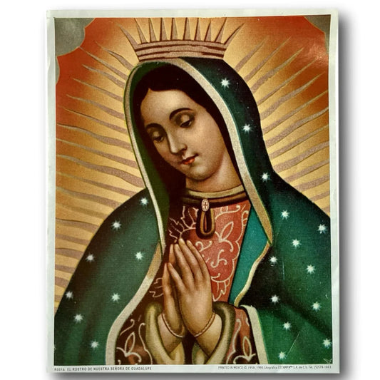 Out-of-print framed religious print of Our Lady of Guadalupe, Catholic devotional art, featuring her face in vibrant colors.