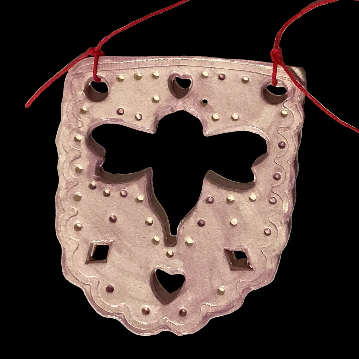 Lavender ceramic ornament with papel picado style design by Lorena Williams for home and garden decoration.