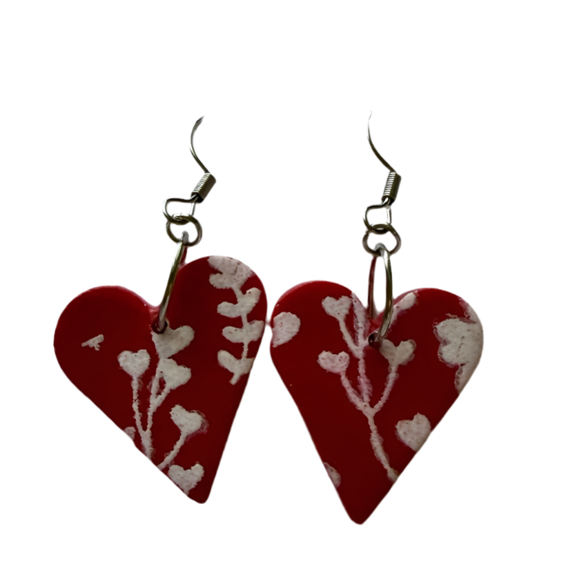 Handmade petite pink heart polymer clay earrings by Lorena Williams, measuring 1 inch in size, showcasing delicate jewelry design.
