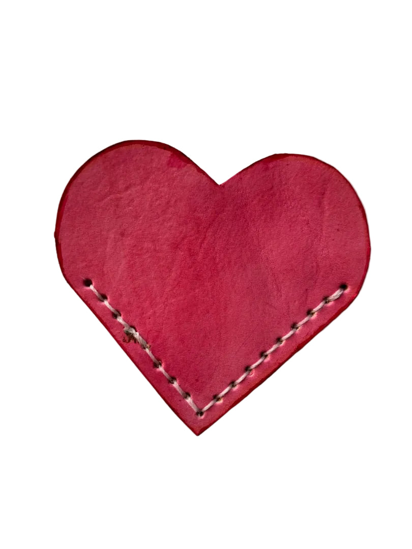 Pink heart-shaped bookmark by Consuelo Barraza, featuring a delicate design for book lovers and home decor.
