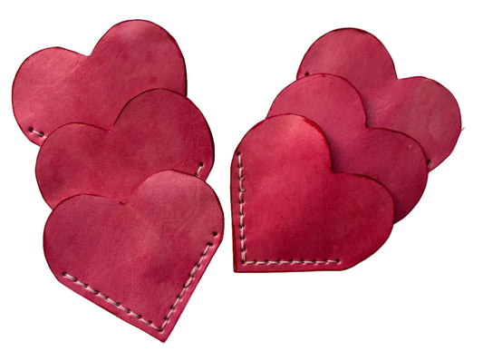 Pink heart-shaped bookmark by Consuelo Barraza, decorative home and garden book accessory with a charming design.