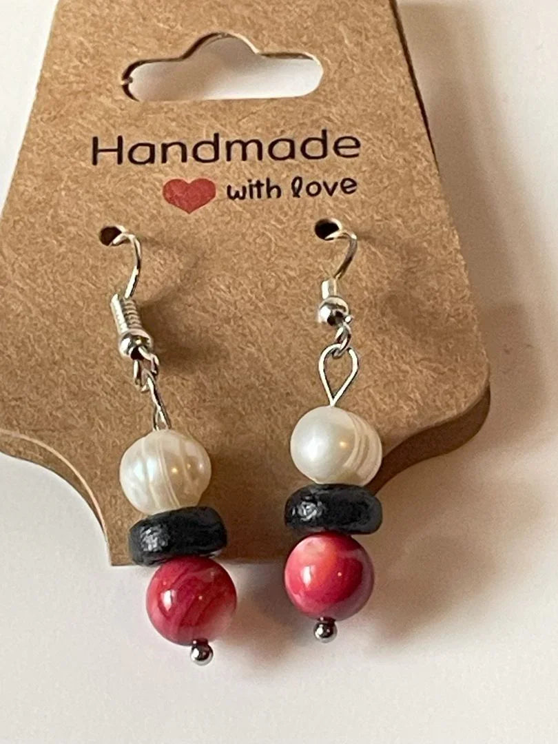 Pink stone and lava bead earrings by Sylvia Leroux, 1.75 inches long, featuring handcrafted jewelry and accessories for stylish wear.