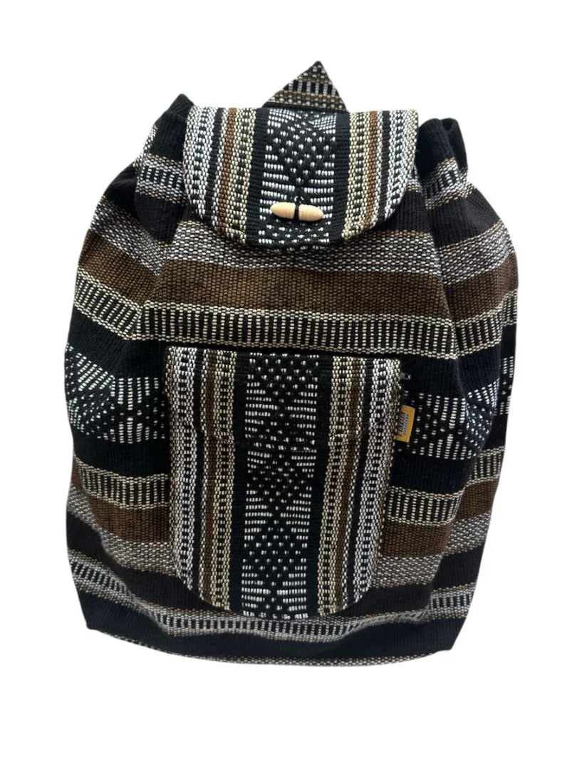 Handcrafted Rasta-inspired artisan backpack by Jose Alberto Chavez featuring colorful woven fabric and sturdy shoulder straps.