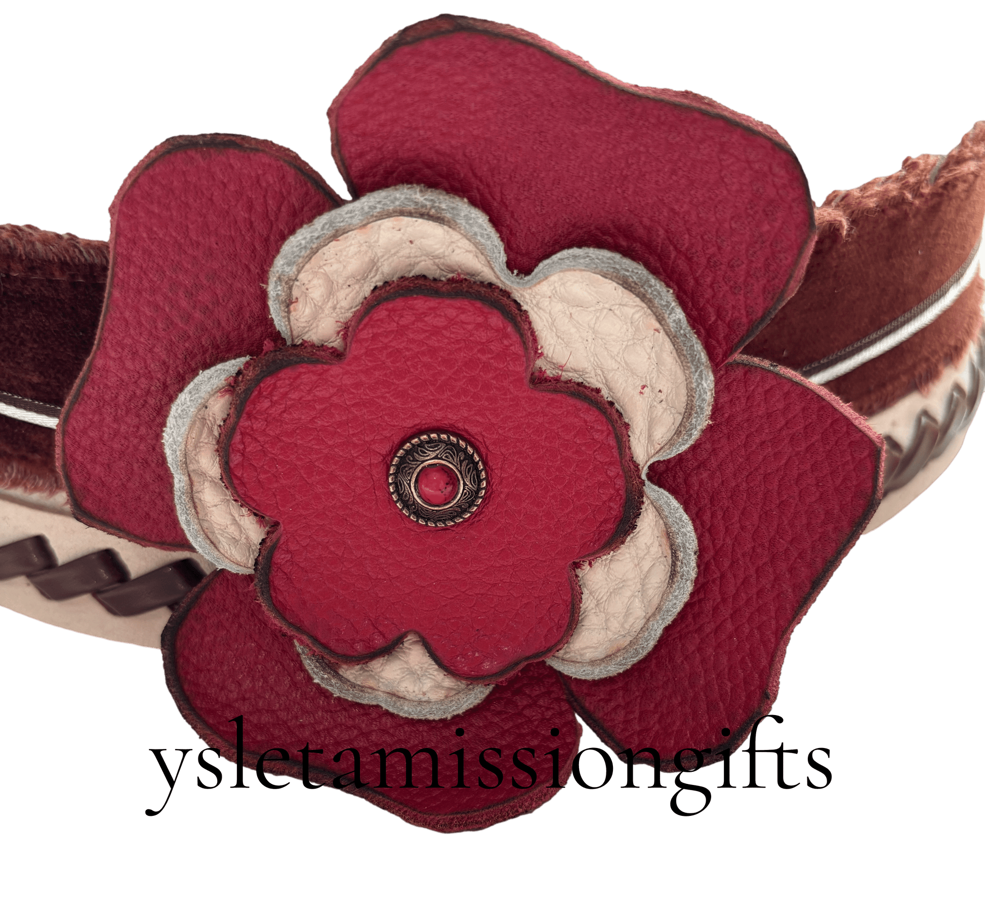 Red and white flower hat clip by Consuelo Barraza, a stylish hair accessory for adding floral charm to your hairstyle.
