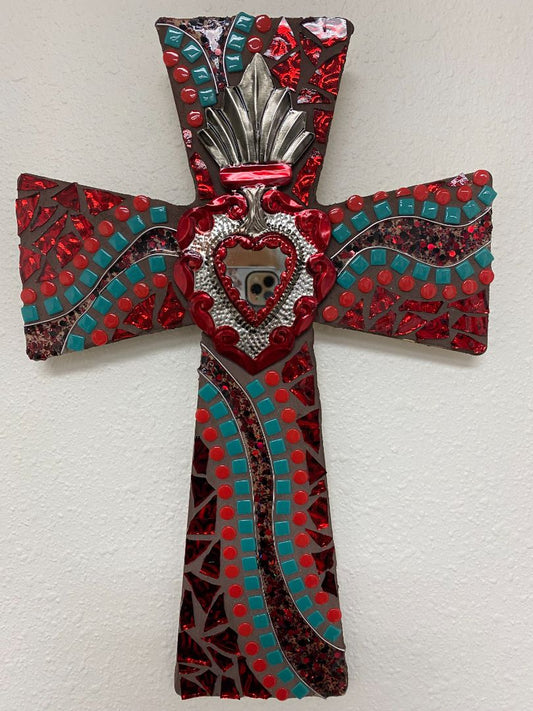 mosaic resin cross in turquoise and red with tin sacred heart in middle on wood