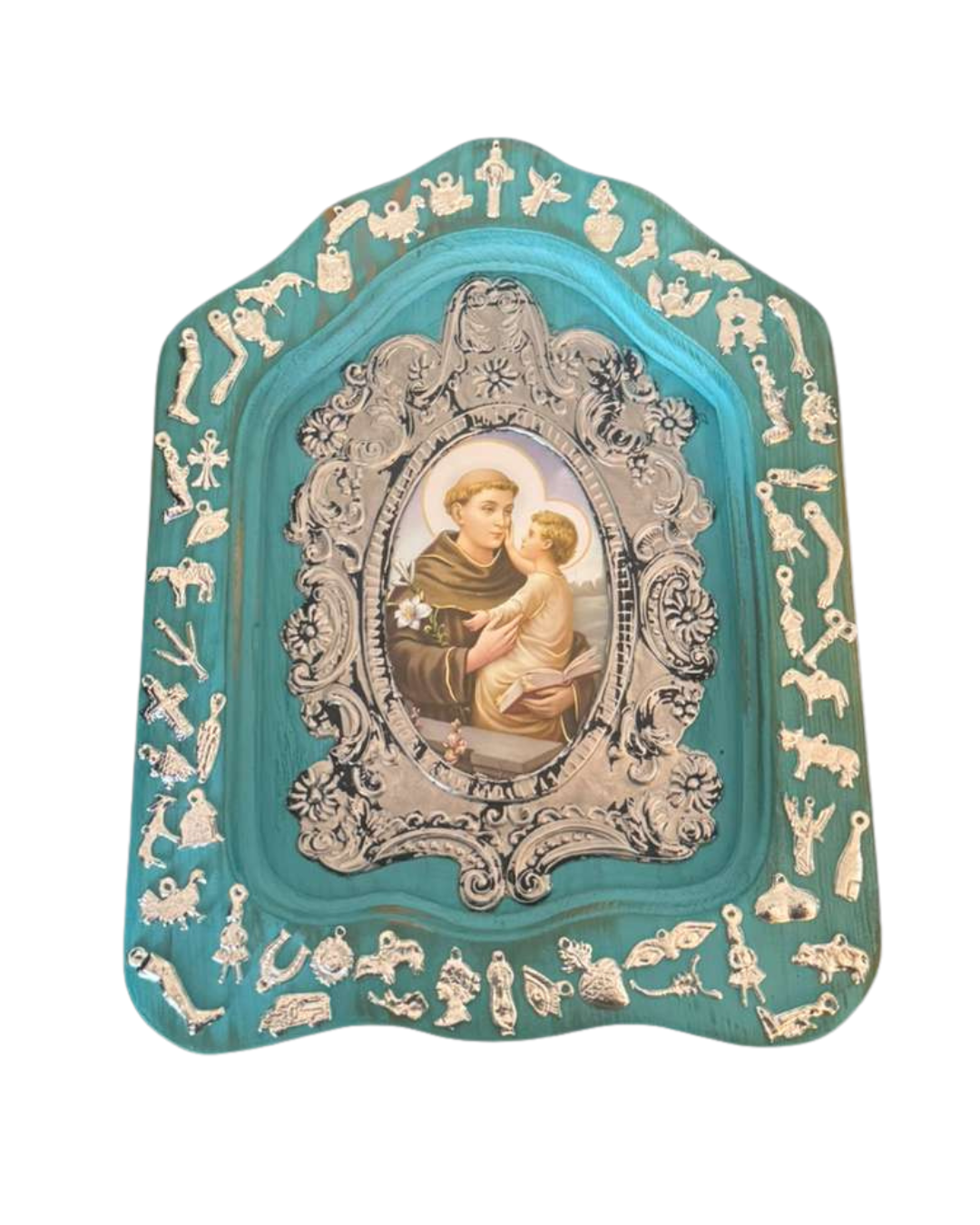 Hand-embossed aluminum and wood Saint Anthony niche with painted blue milagros, measuring 10x13x5 inches, by Marilu Fuentes.