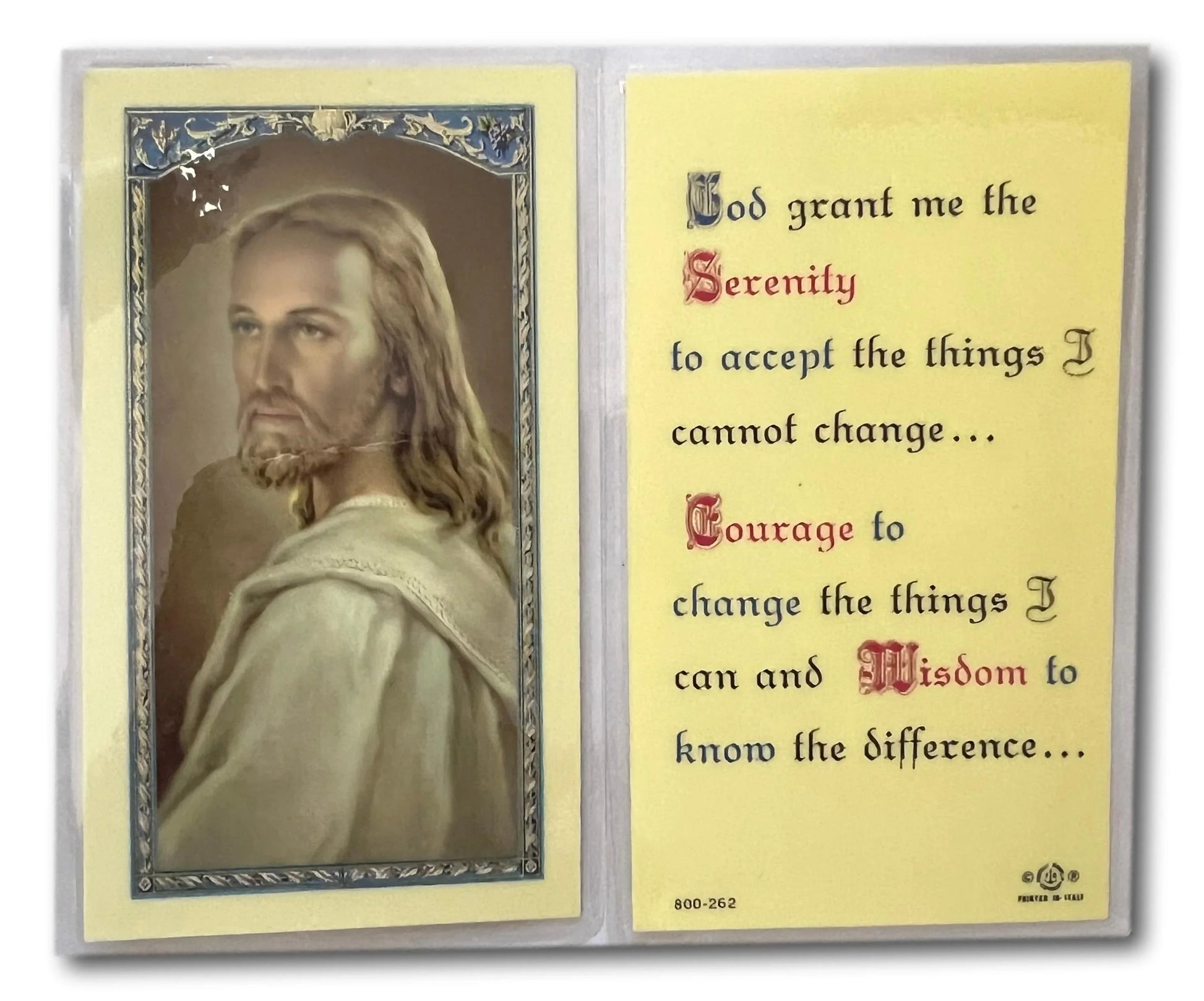 Laminated Serenity Prayer devotional card featuring Catholic Christian spiritual message and peaceful design.