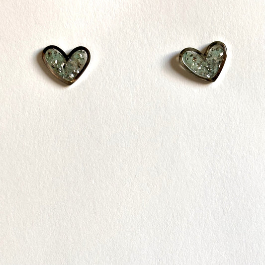 Silver stainless steel heart stud earrings with blue glitter resin from Melissa Cortinas, jewelry and accessories.