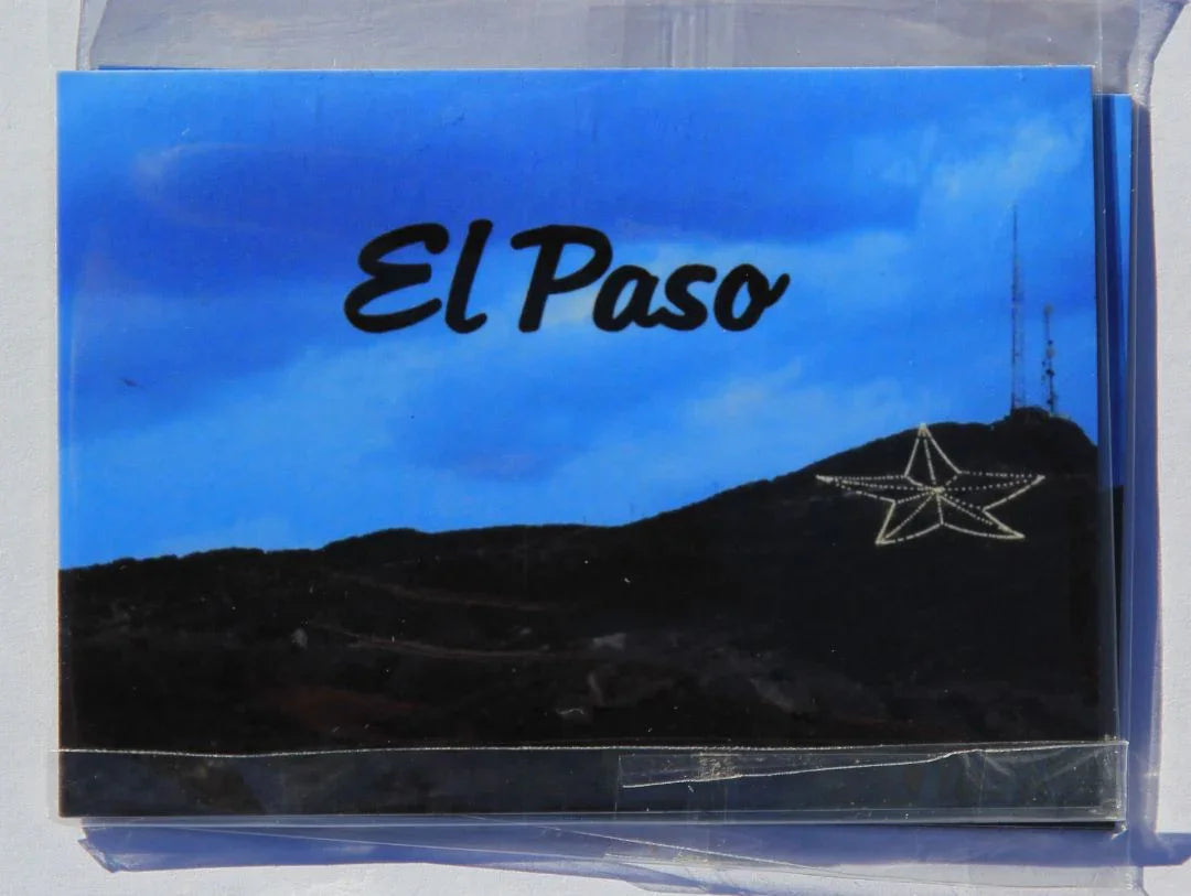 Blue sky and mountain star magnet by Miguel Martinez, 2.5 x 3.5 inches, souvenir decorative magnet with mountain and star design.