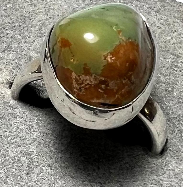 Sterling silver Hacita turquoise ring by Ray Duck, Native American jewelry, size 7.25, featuring intricate silver and turquoise design.