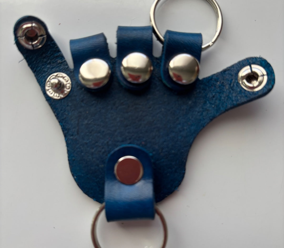 Vegan leather hand keychain by Consuelo Barraza featuring a stylish and durable accessory for handbags and keys.