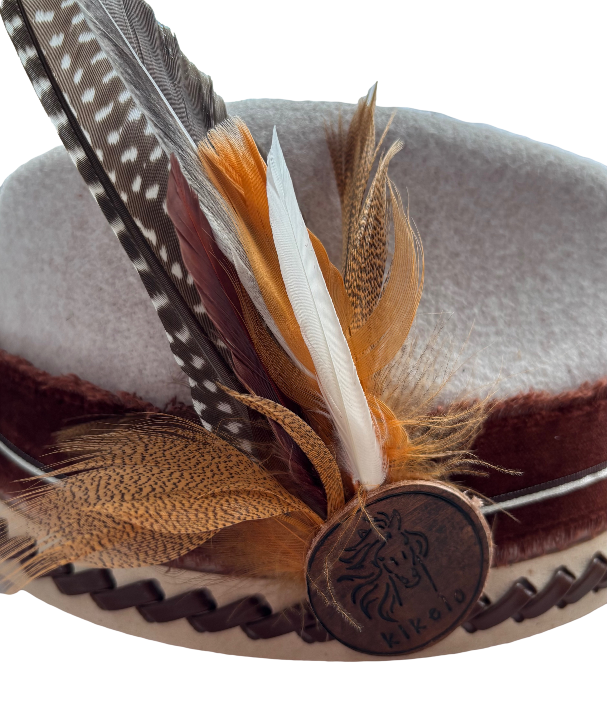 Western feather hat clip by Consuelo Barraza featuring decorative feathers, designed for hair accessories and western-themed fashion.