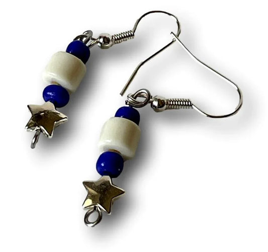 White acrylic cylinder bead earrings with blue seed beads, silver star charms, 1-inch dangle, by Sylvia Leroux.