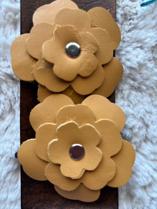 Yellow leather flower ponytail holder with matching bookmark, cheerful handmade accessory by Consuelo Barraza.
