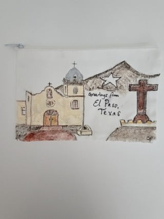 Ysleta Mission zippered bag featuring Cheryl Peterson's original artwork with colorful, detailed designs on a fabric bag.